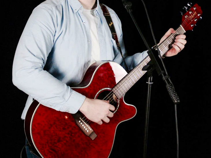 Red takemine electro-acoustic guitar