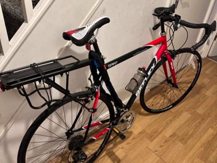Road bike with pannier rack and heavy duty chain lock