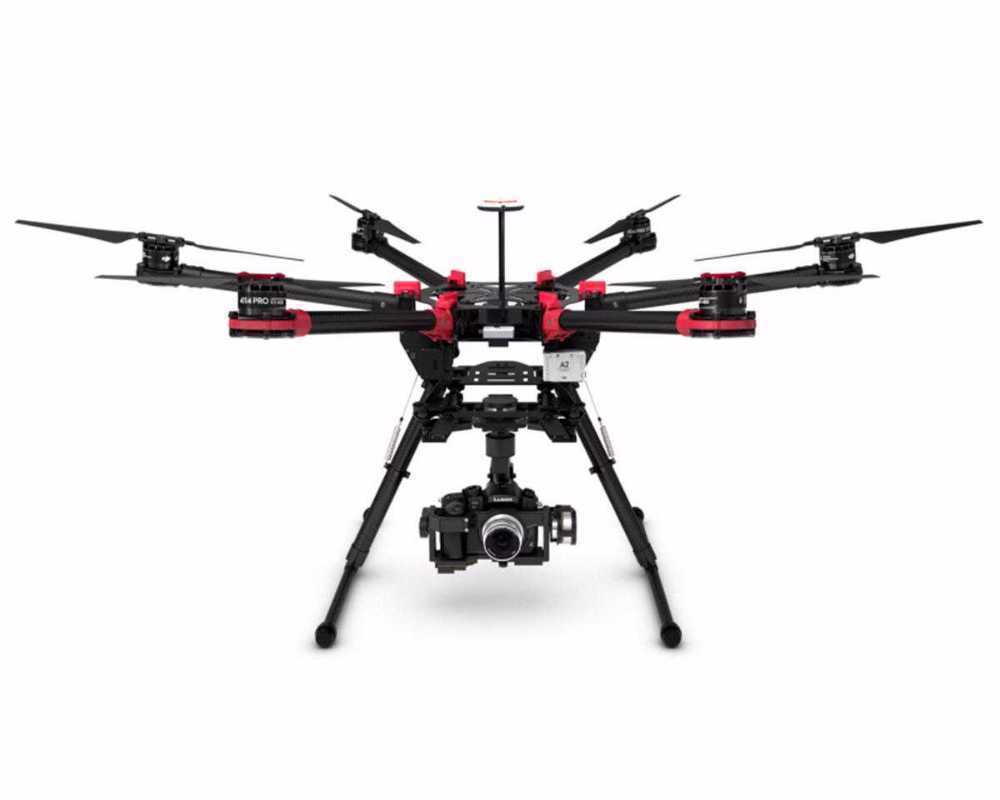 Dji s900 drone with panasonic gh4 camera with operator
