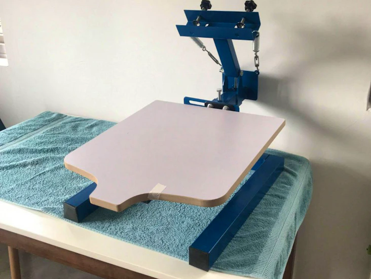 Screen printing press (and accessories if required)