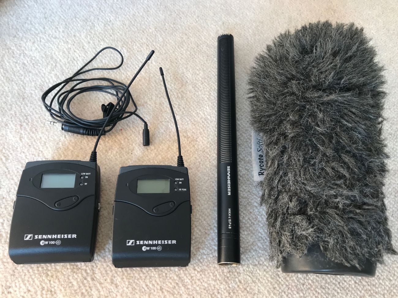 Sennheiser shotgun mic and wireless mic set.