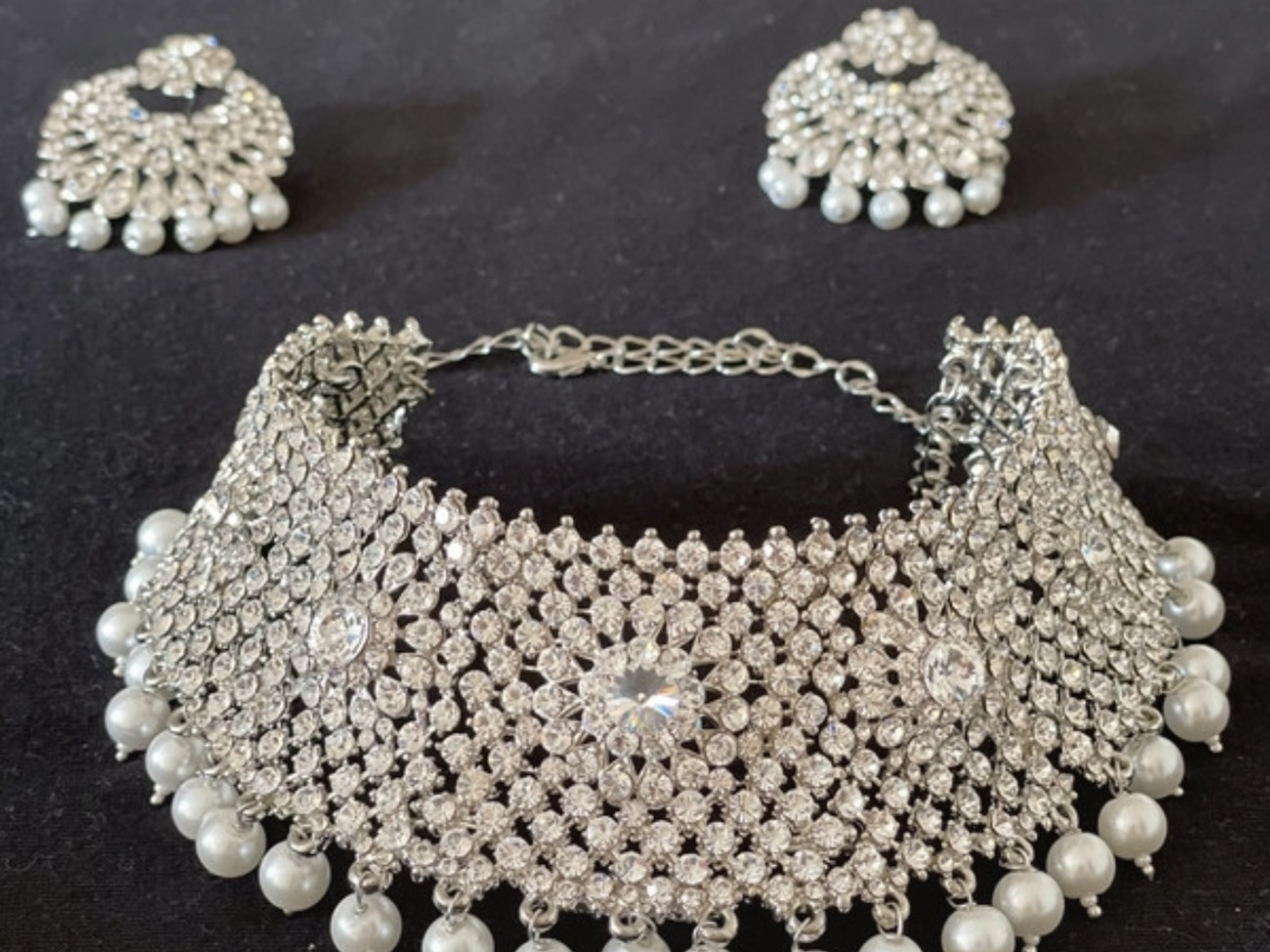 Silver statement necklace and earrings