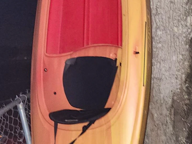 Single person kayaks with paddles