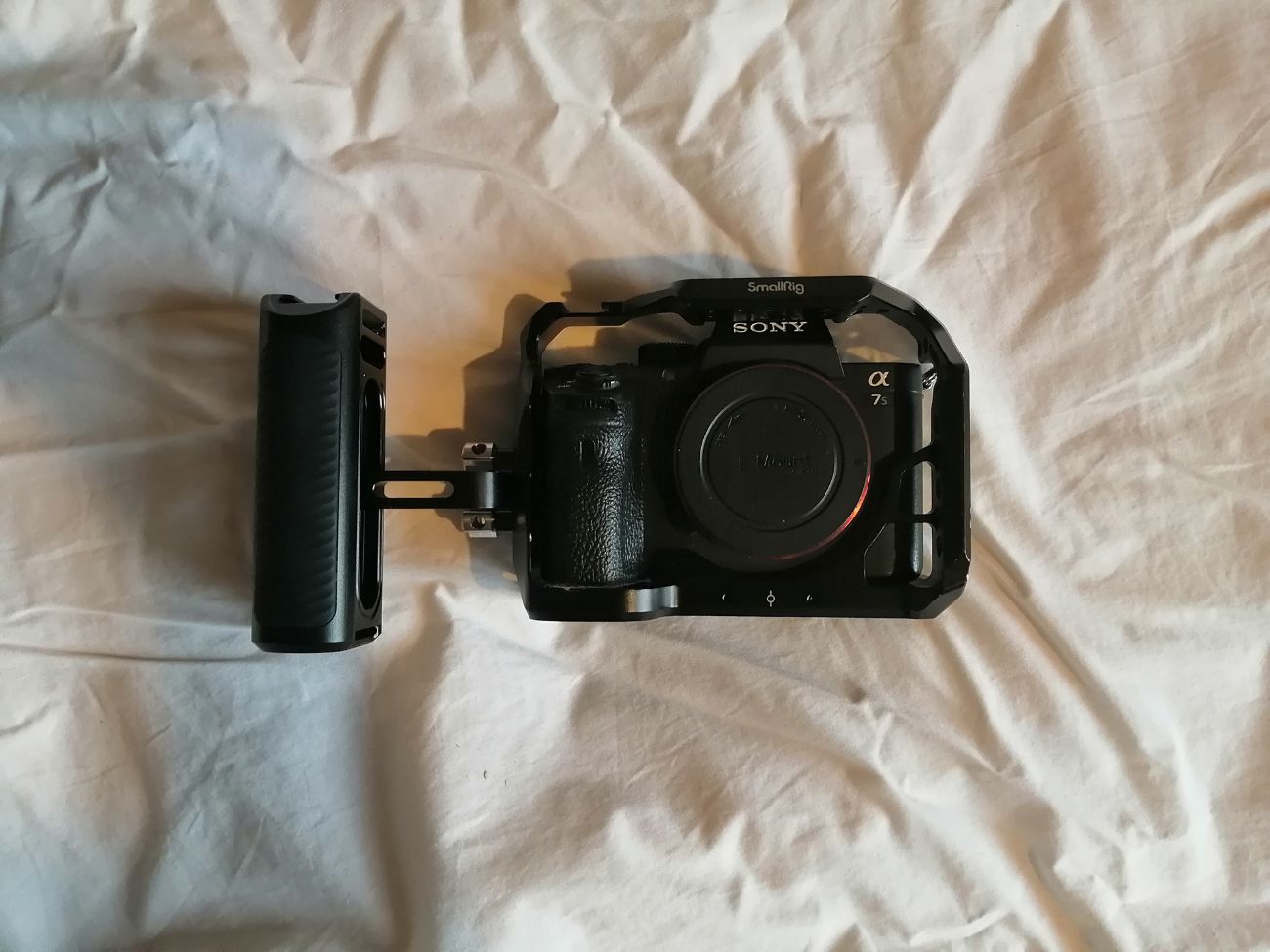 Sony a7s ii body w/ cage & handle, 128gb sd card