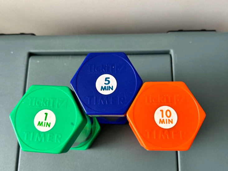 Three giant sand clocks