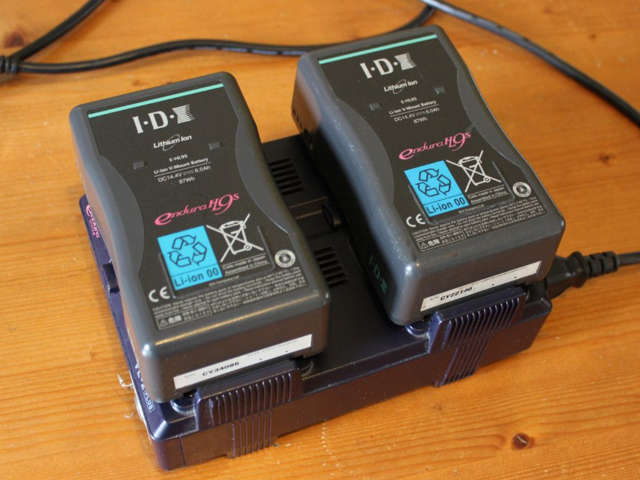 Two v lock batteries and charger