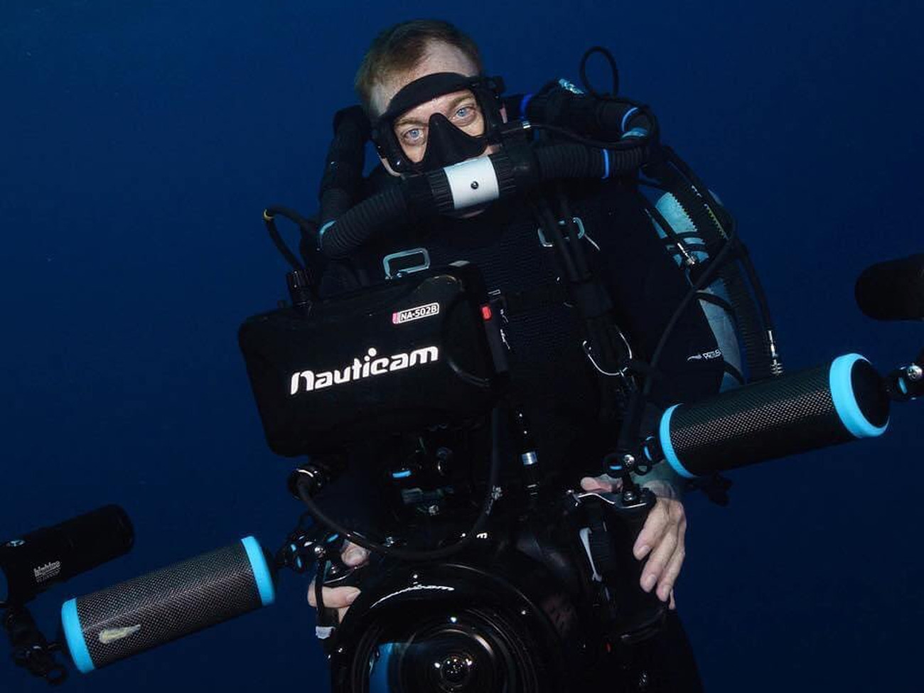 Underwater camera operator with cinema camera