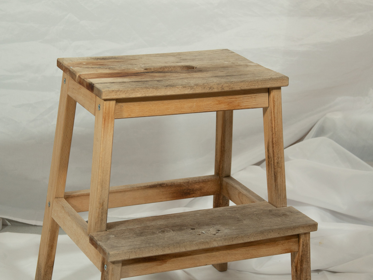 Weathered wooden step stool