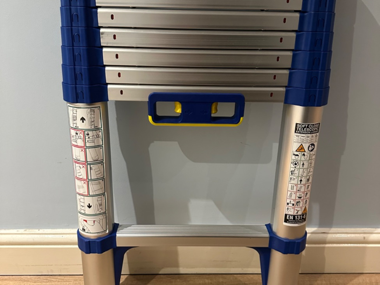 Werner soft-close telescopic ladder