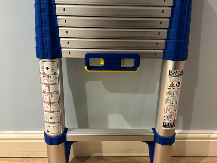 Werner soft-close telescopic ladder