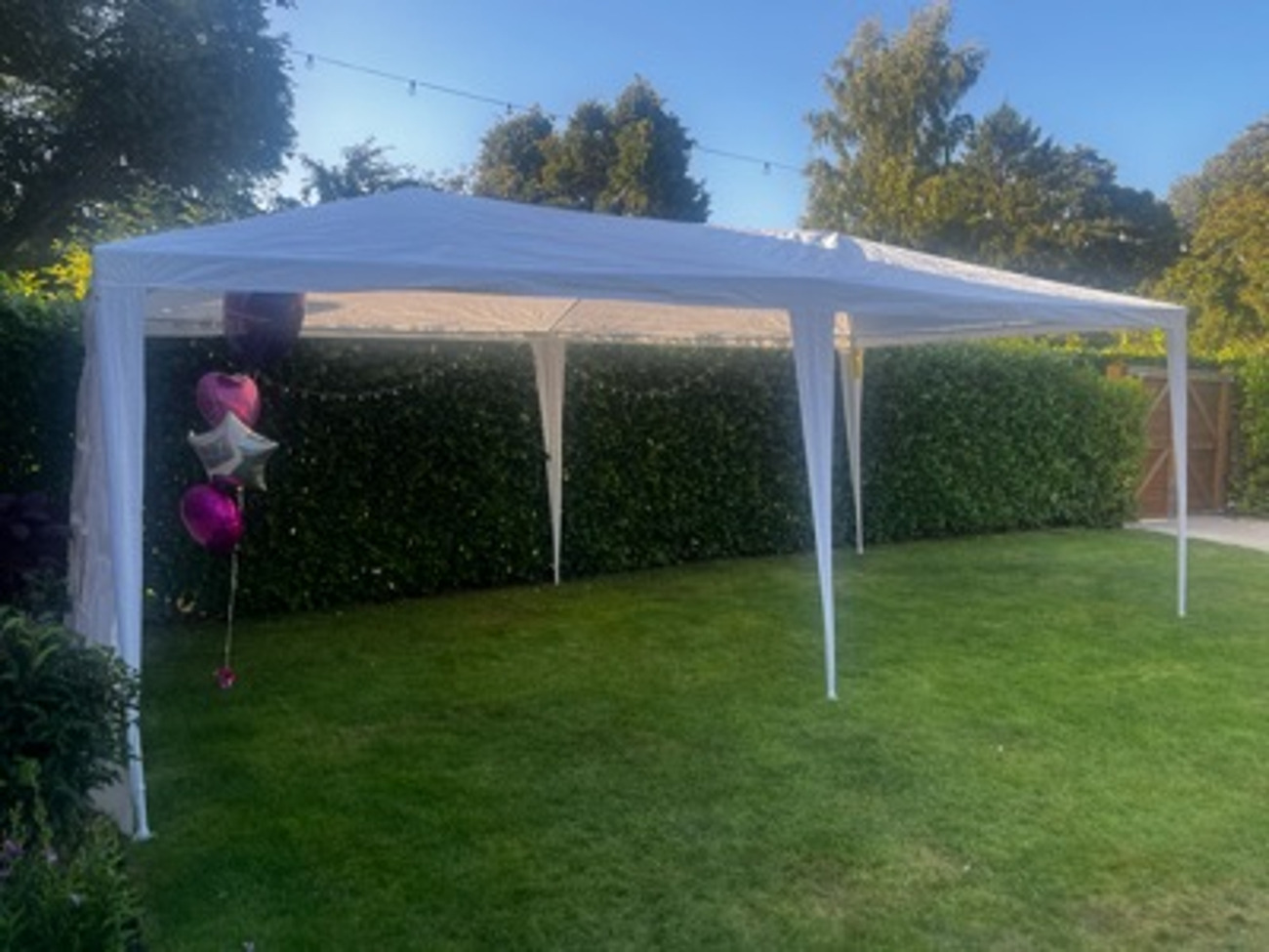 White gazebo 3m x 6m with removable sides