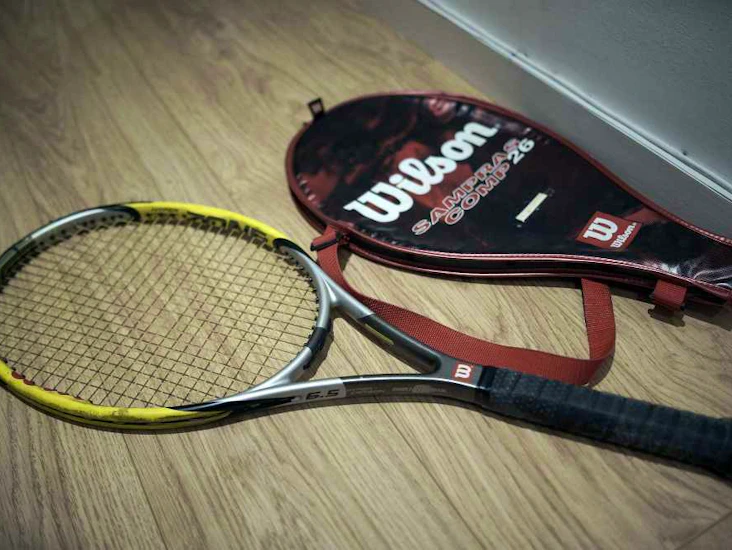 Wilson carbon tennis racket & artengo tr190 lite v2 racket
