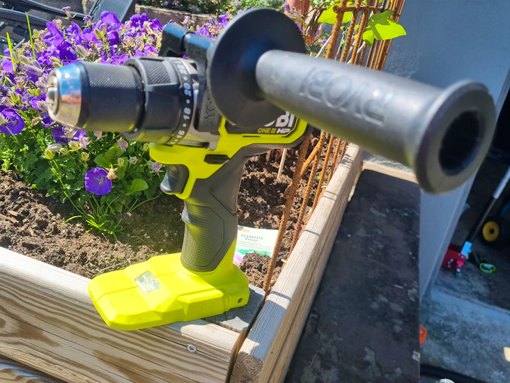 Borrskruvdragare med slag ryobi