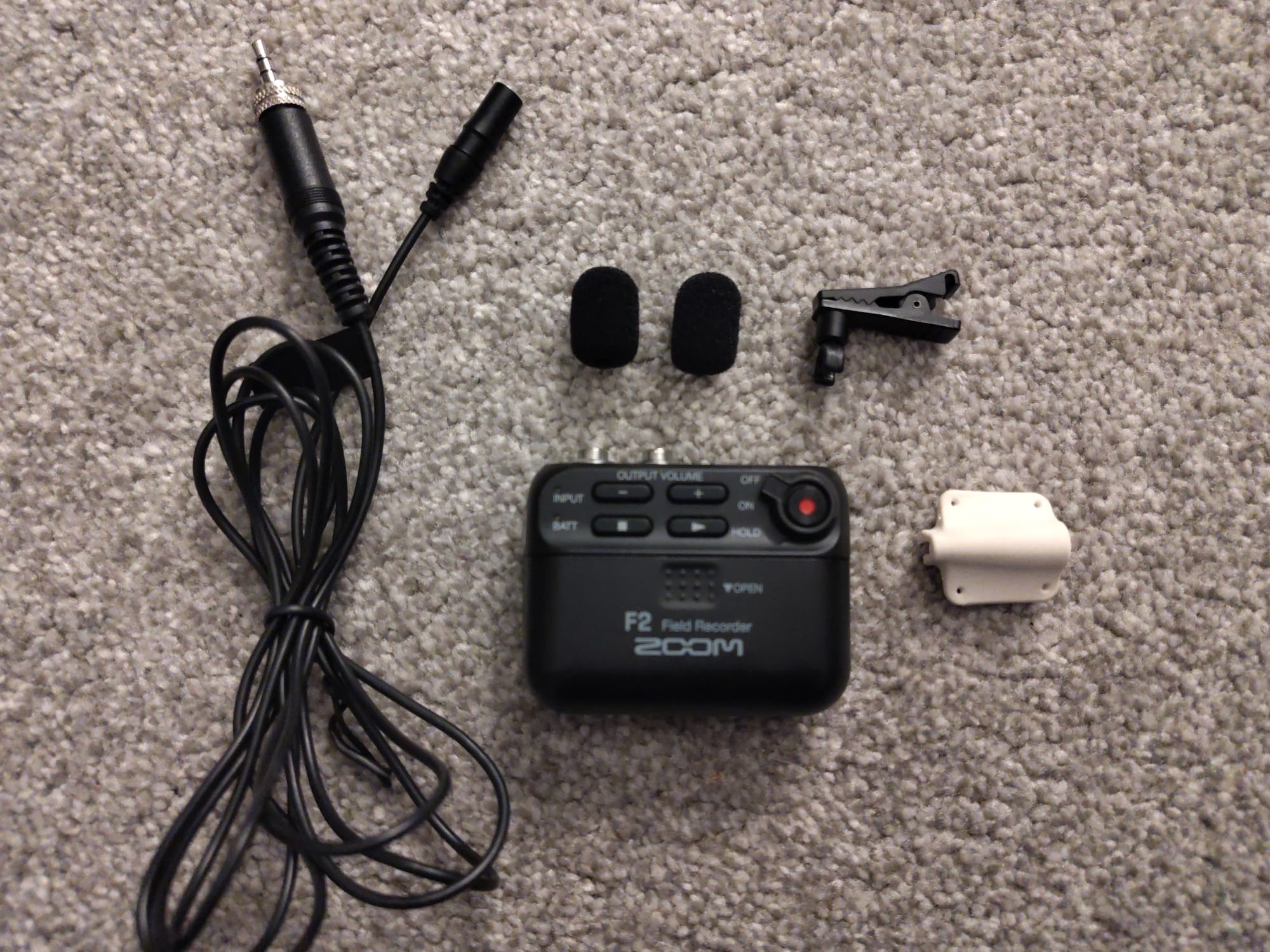 Zoom f2 field recorder and lavalier microphone