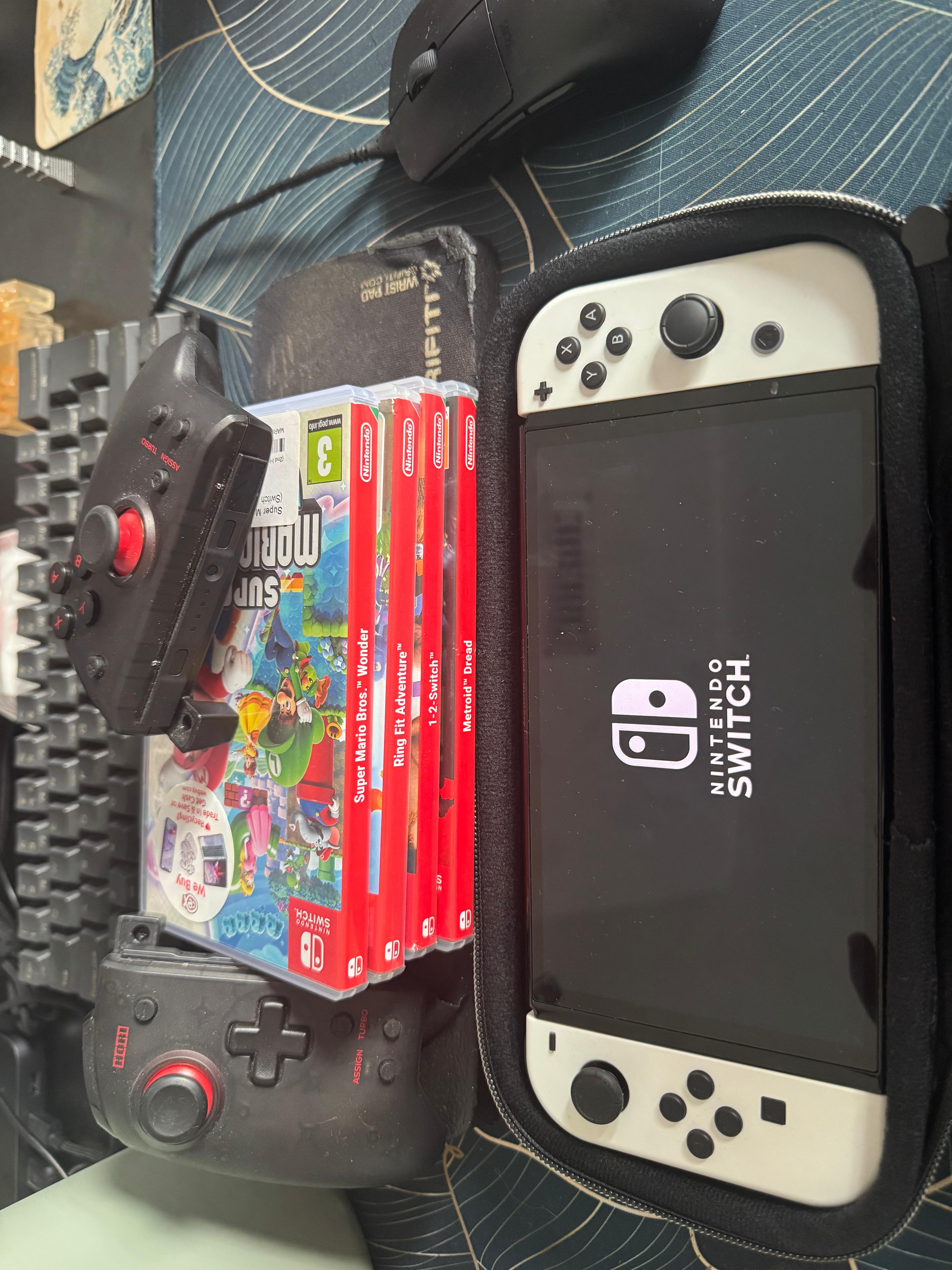 Nintendo switch oled + games