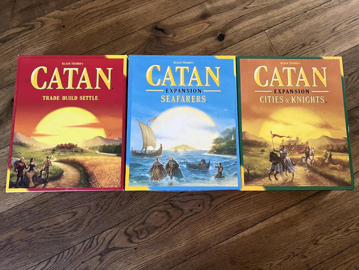 Settlers of catan with seafarers and cities & knights expansions