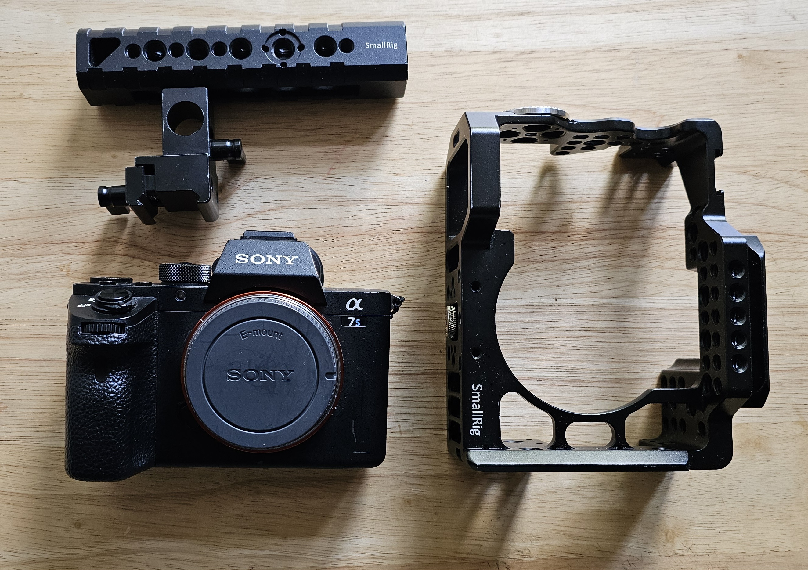 Sony a7sii & 2 batteries with optional small rig cage &top handle 