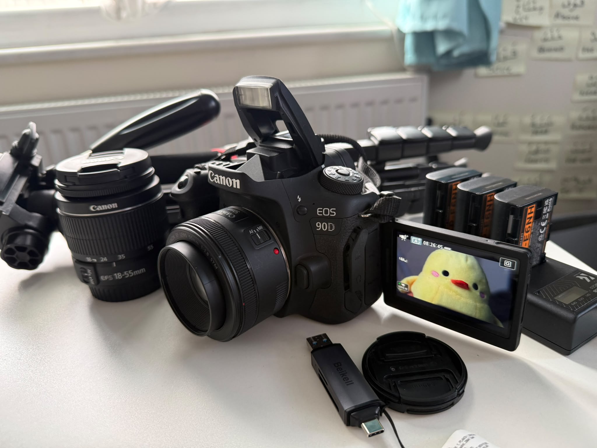 Canon eos 90d kit with ef 50mm f/1.8 stm lens & x4 batteries + bonus 18-55mm lens  - perfect for photo and long video shoots (base and strap + 128 gb sd +  card reader + 2 lens + x4 batteries + charge dock + camera bag)