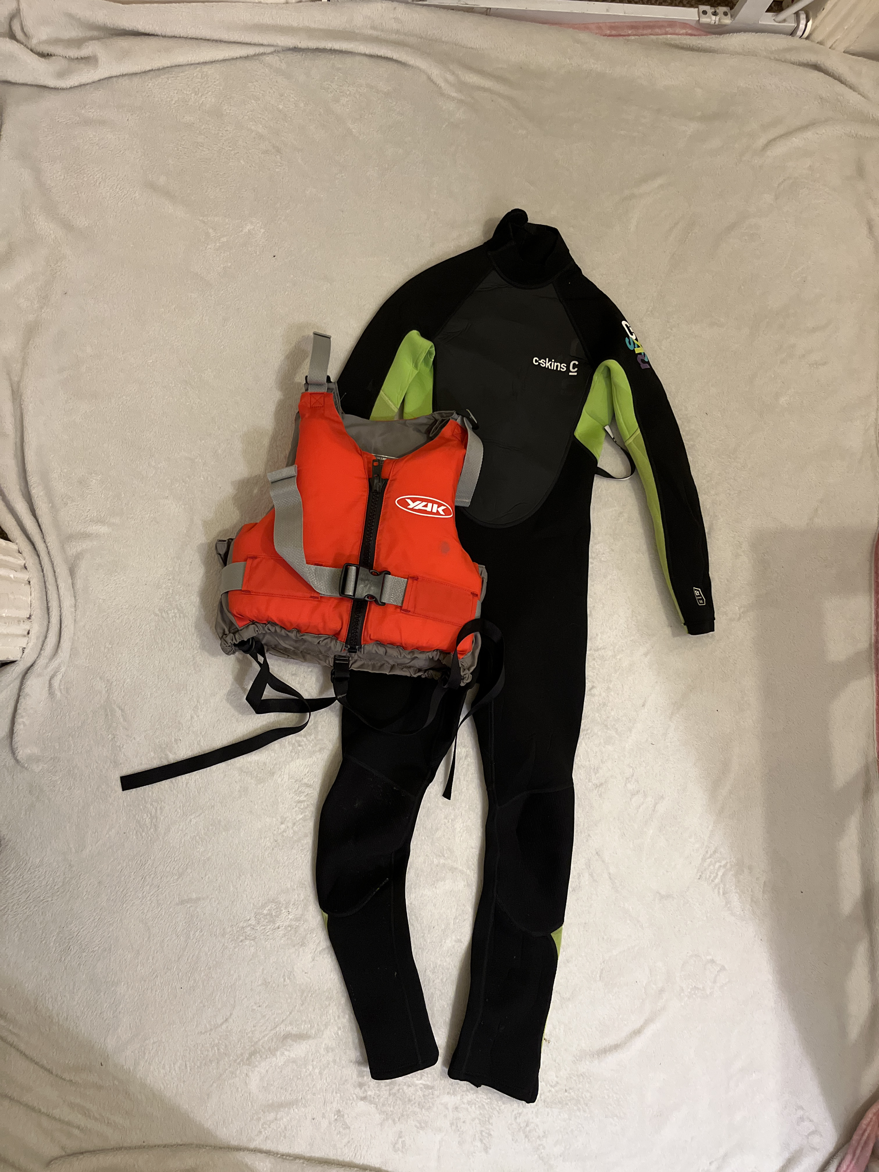 Childs c skins 3/2mm wetsuit - size l with a buoyancy aid