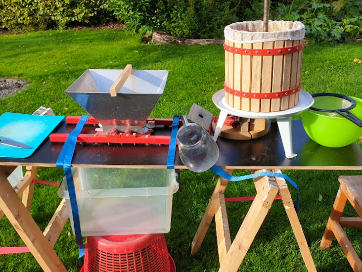 Portabelt musteri - fruktkross & fruktpress