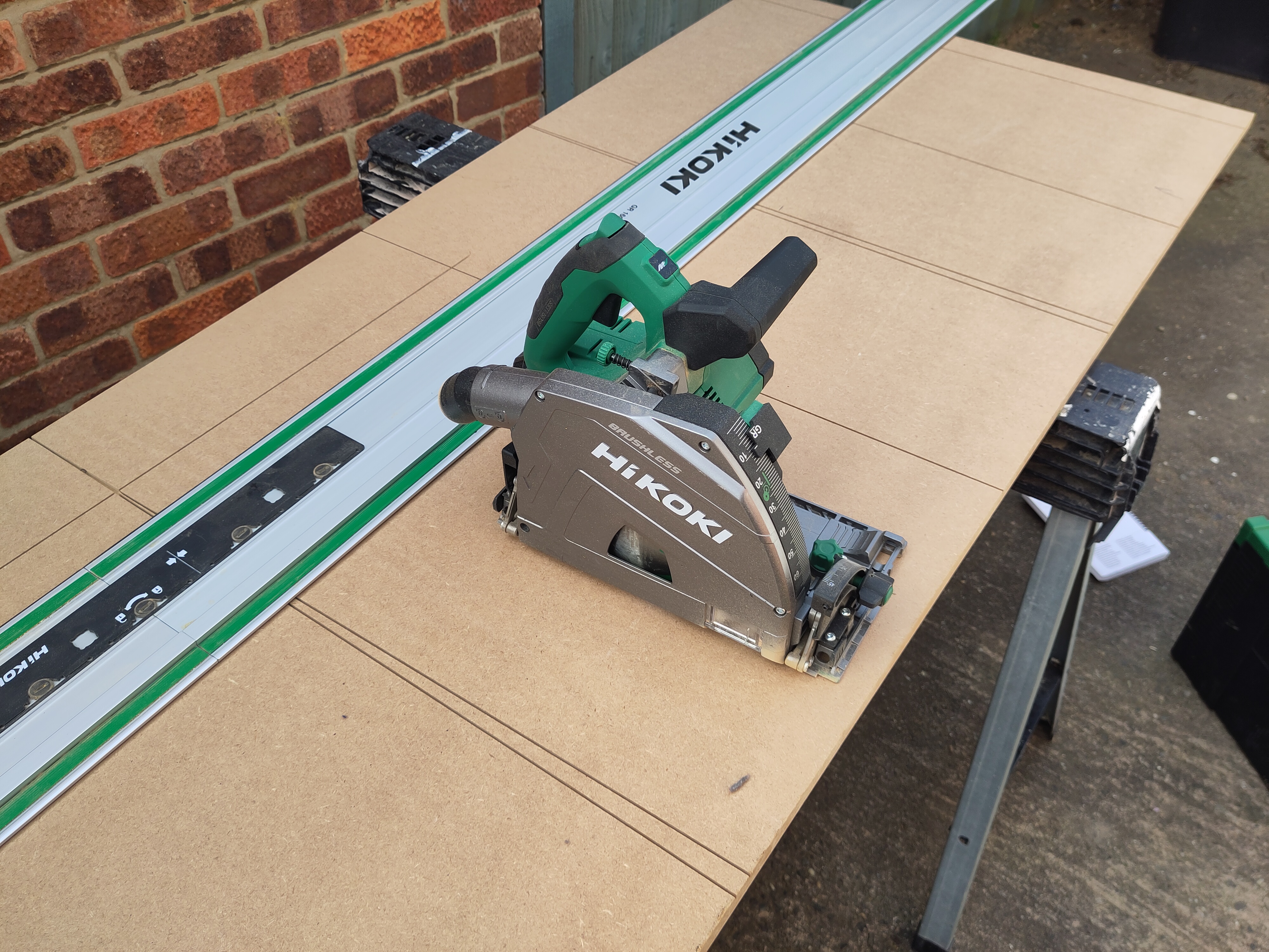 Hikoki 36 volt plunge saw with track