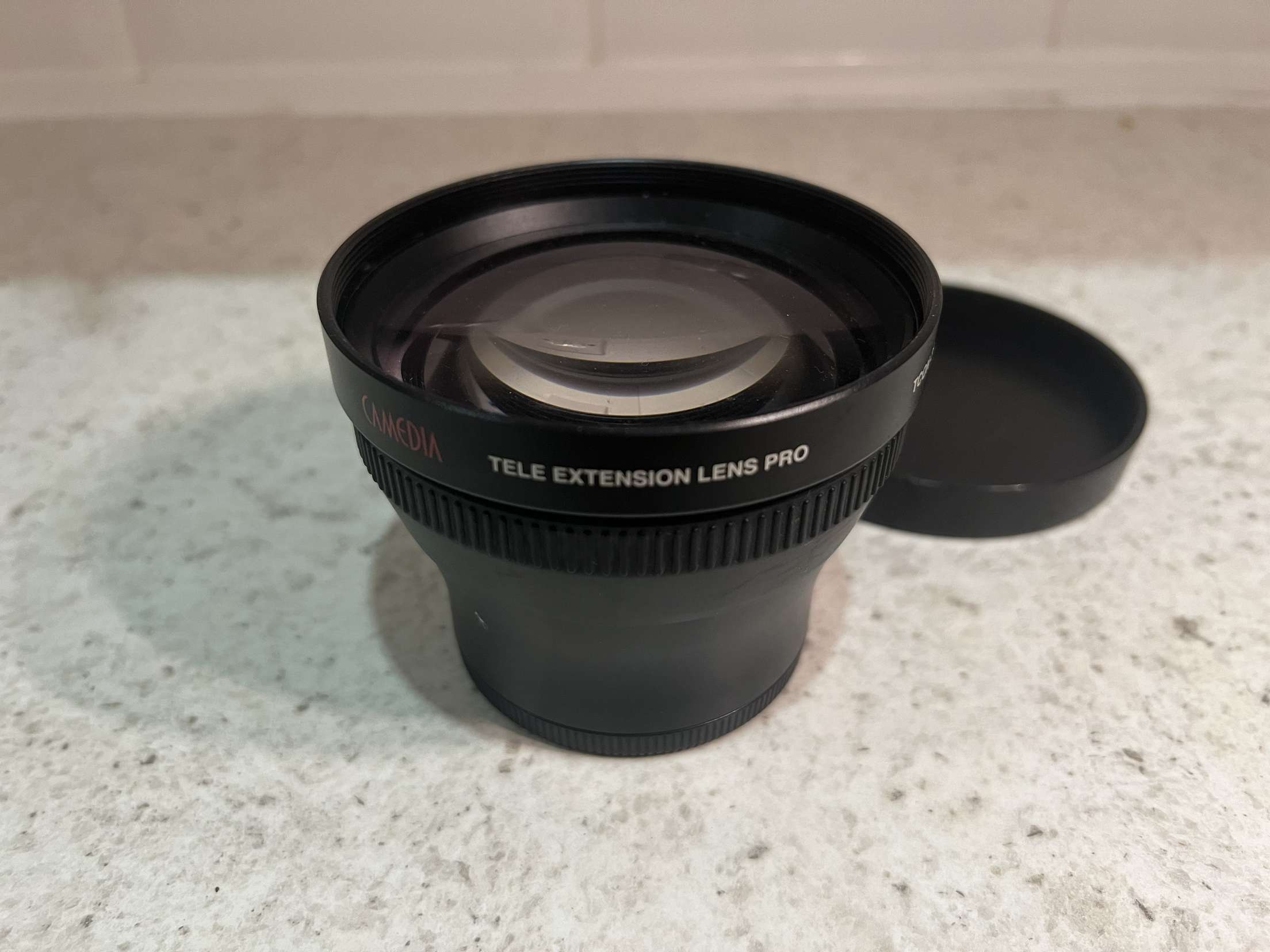 Tele extension lens tcon-14
