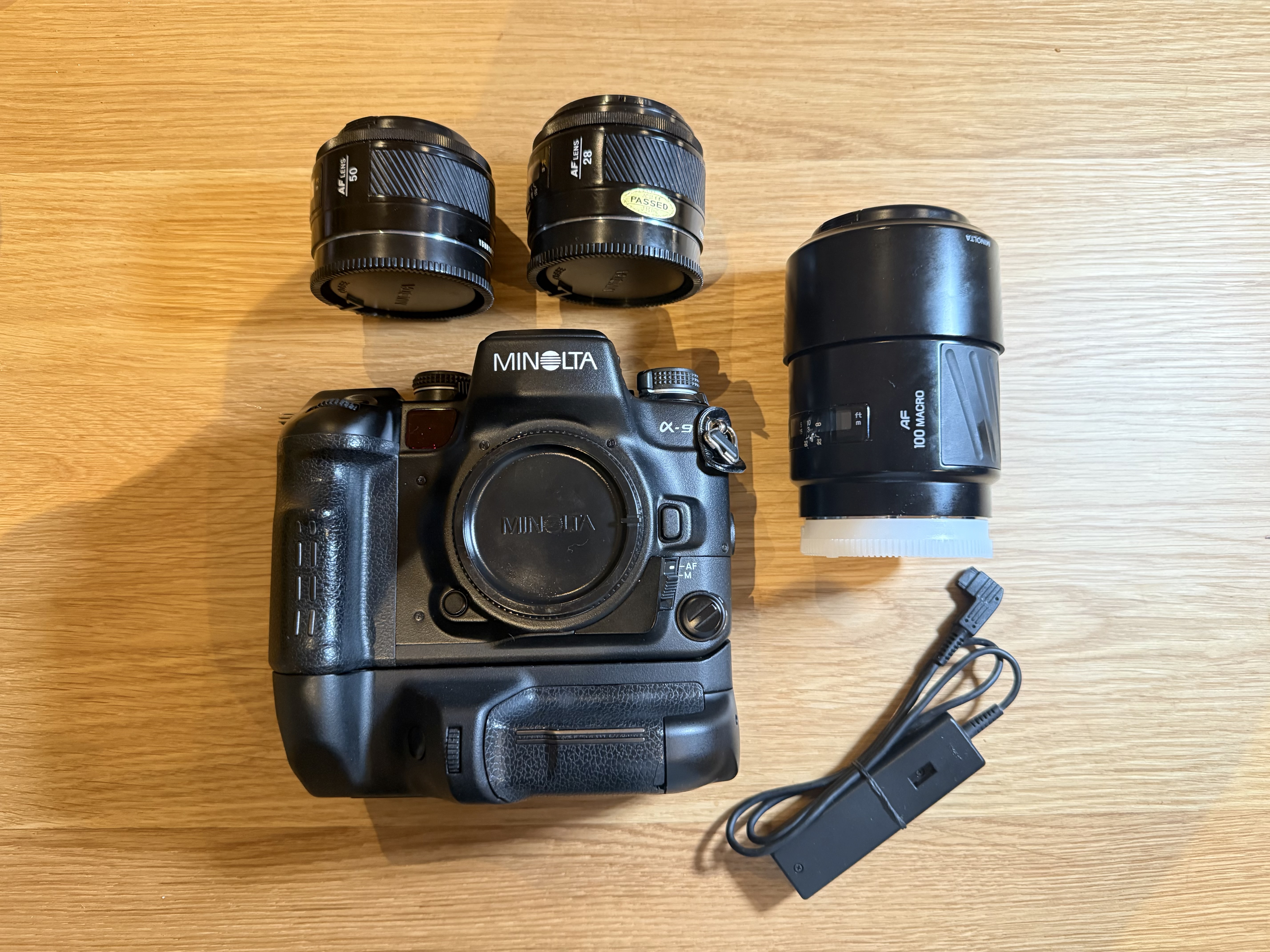 Minolta a-9 alpha maxxum dynax slr af 35mm film camera - 28mm f2.8, 50mm f1.4 & 100mm  f2.8 + vertical grip