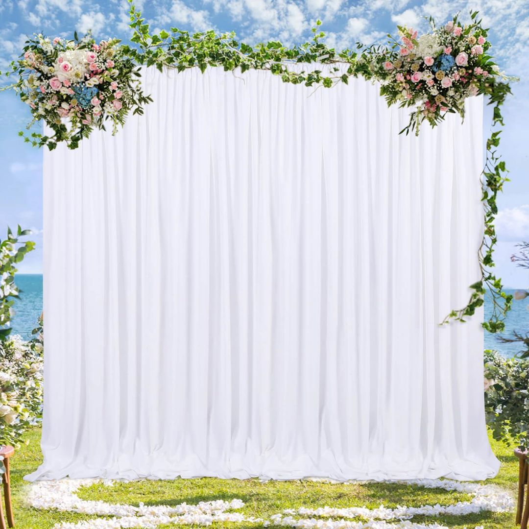 2 white backdrop curtains