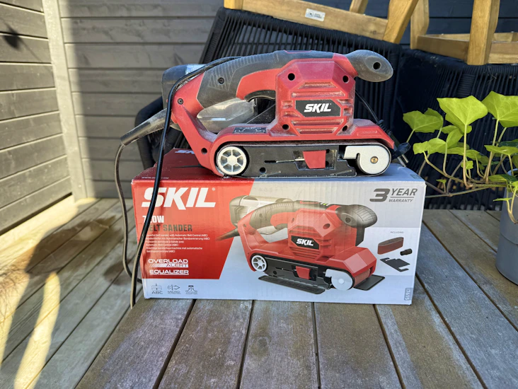 Slipmaskin (bandslip) skill med filter