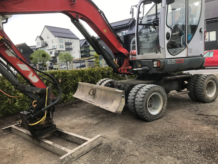 Grävmaskin med förare