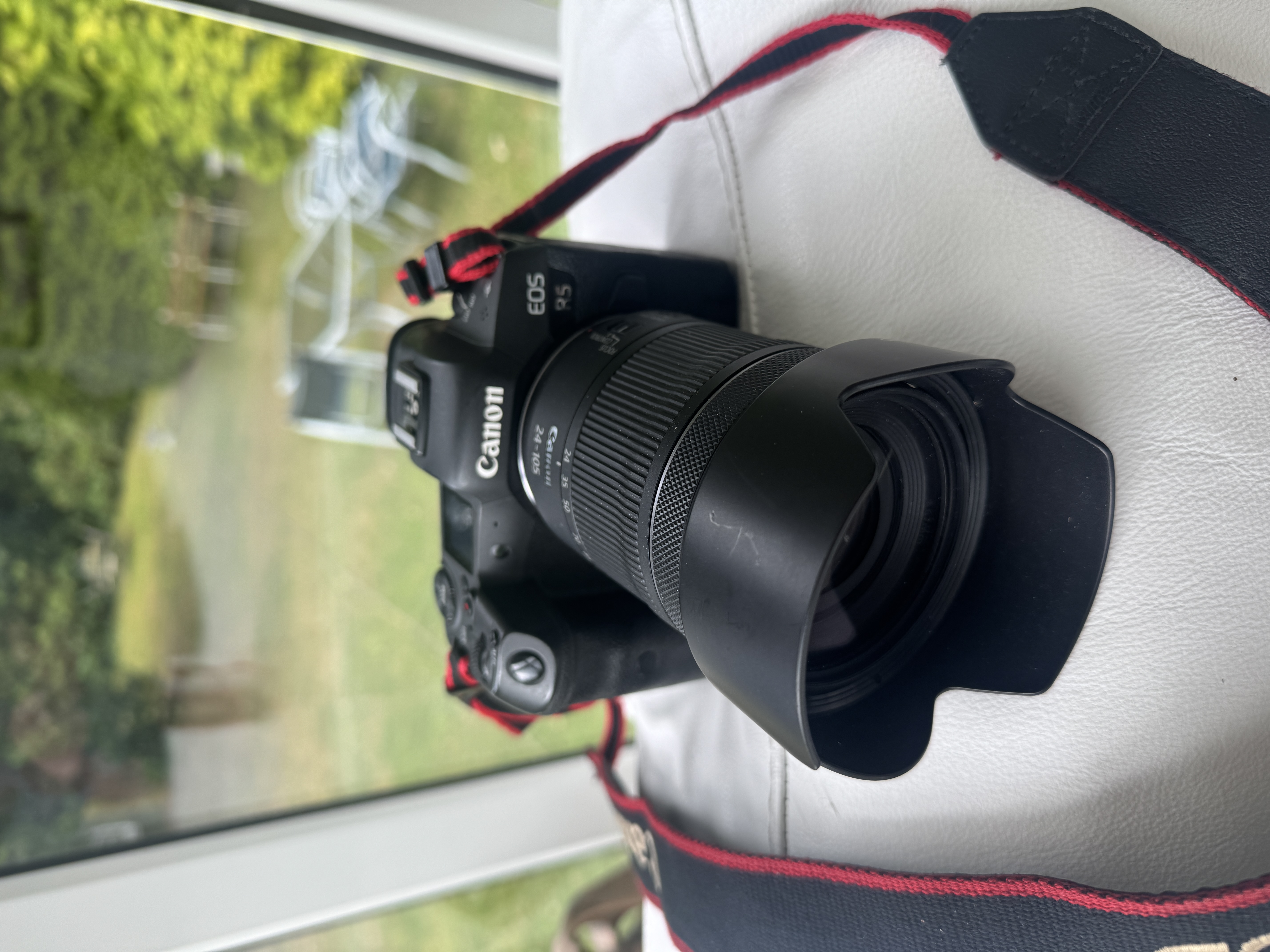 Canon r5 mirrorless camera body with 2 batteries and charger.