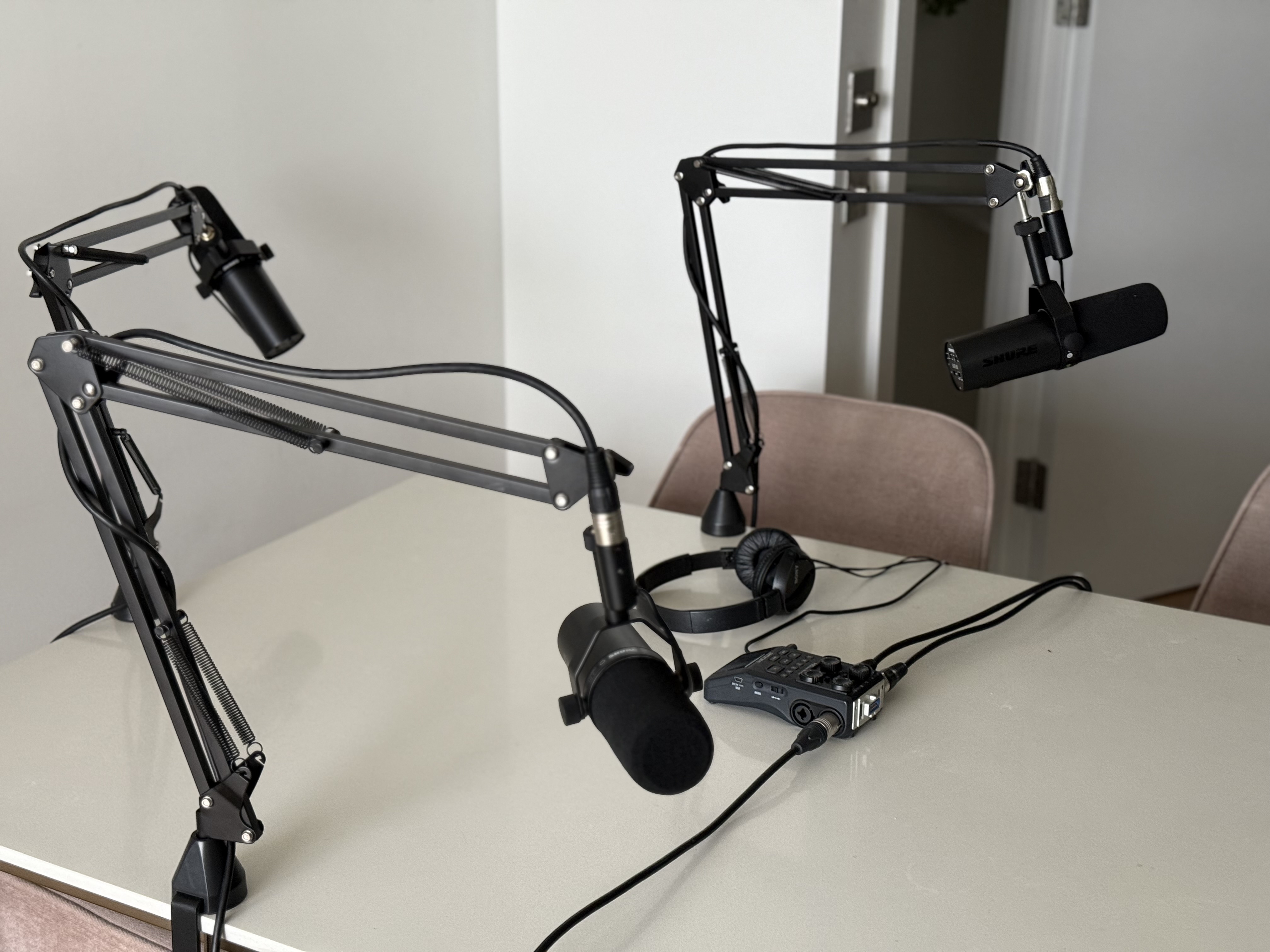X3 podcast mics set up with recorder, cables and headphones