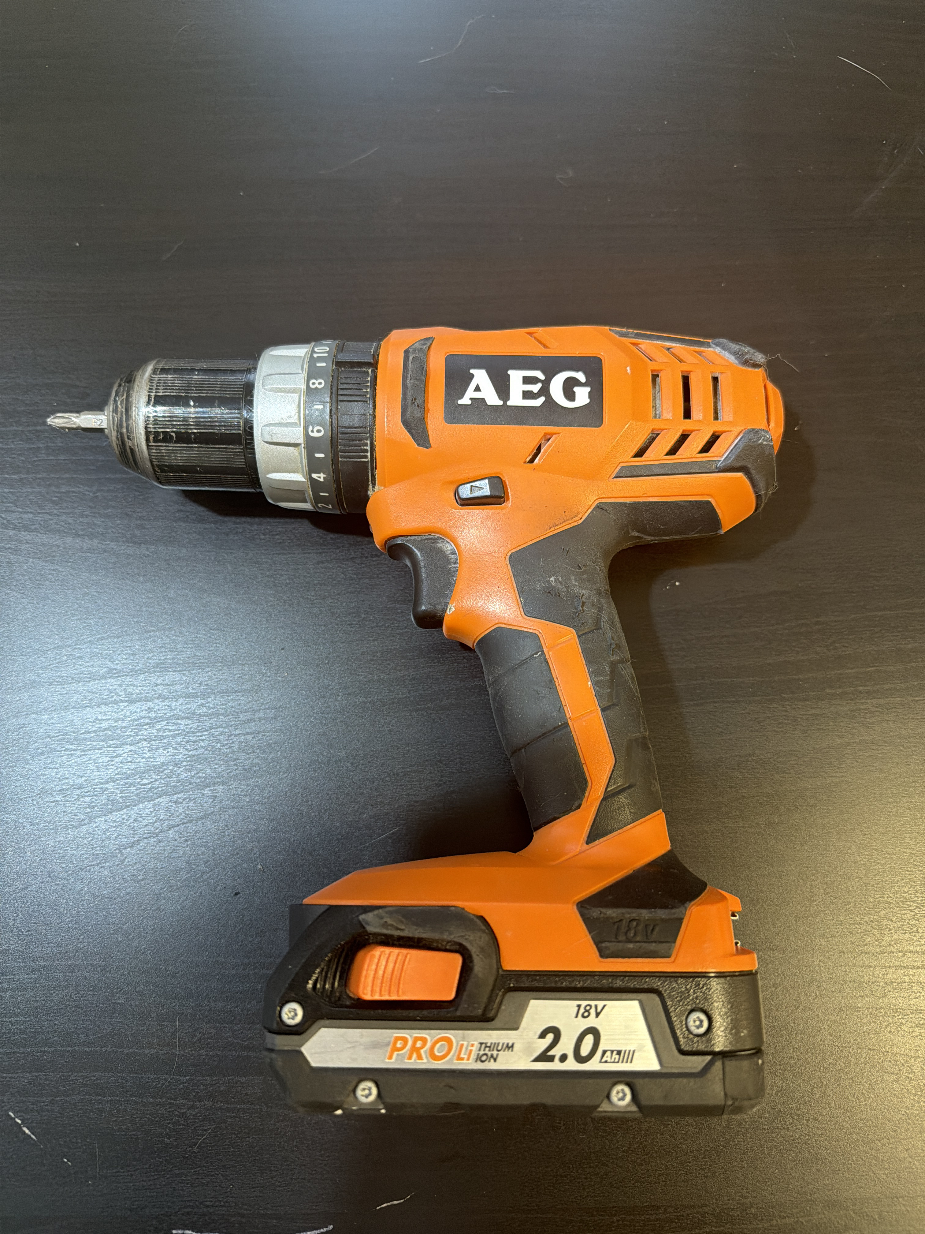 Borrskruvdragare med slag