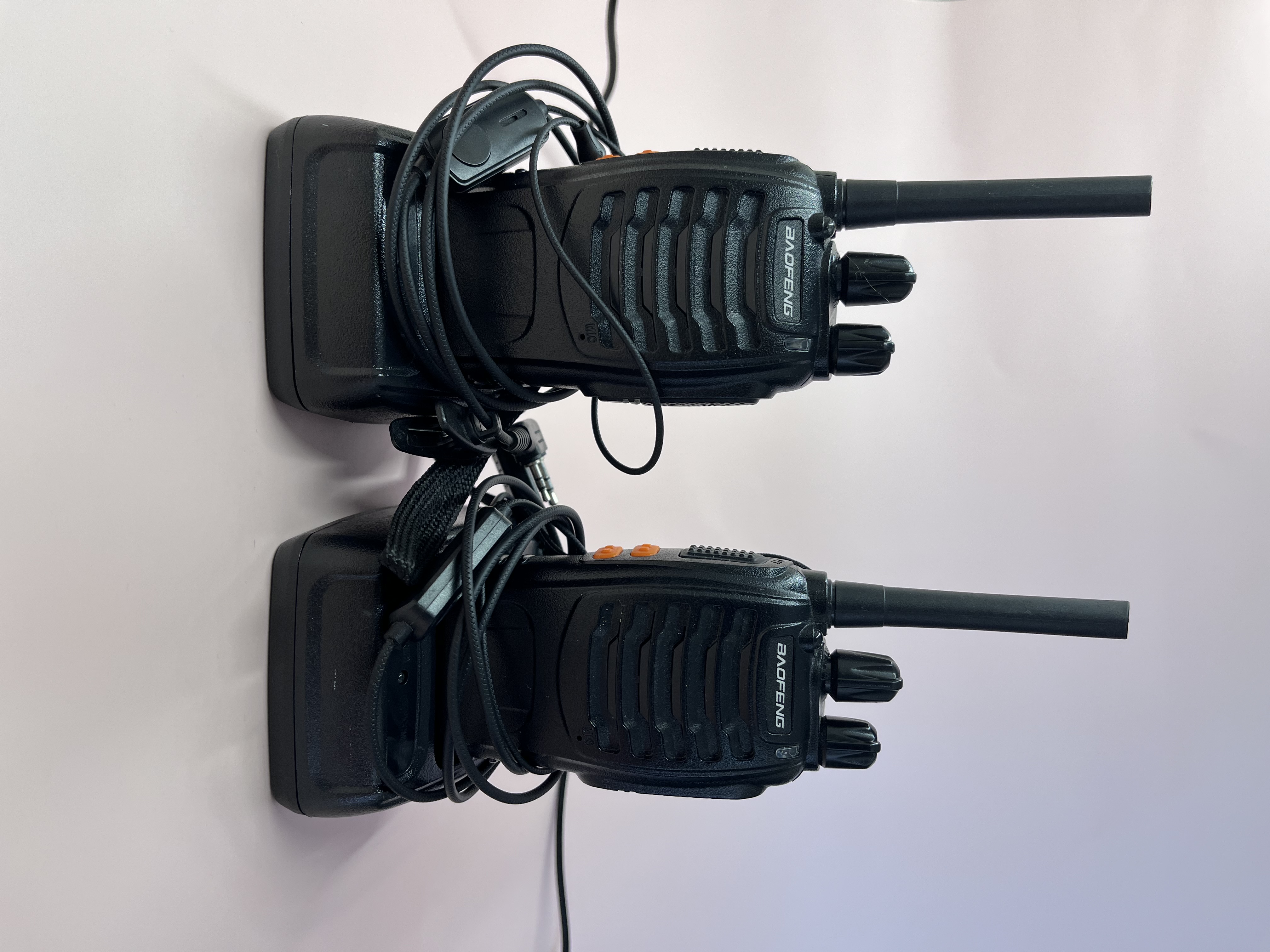 X2 walkie talkies w/ earpieces & chargers