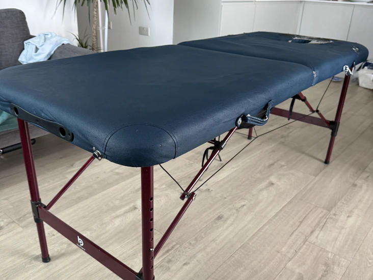 Massage table