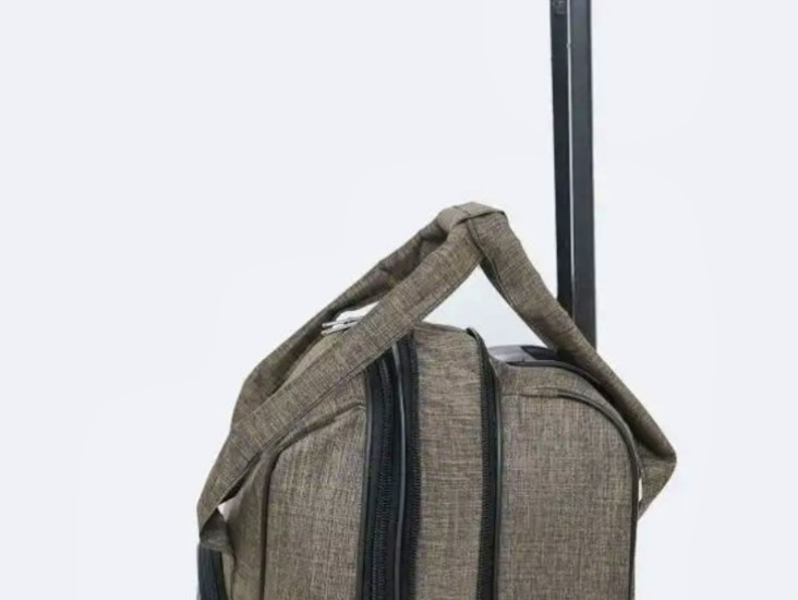 Käsitavara matkalaukku