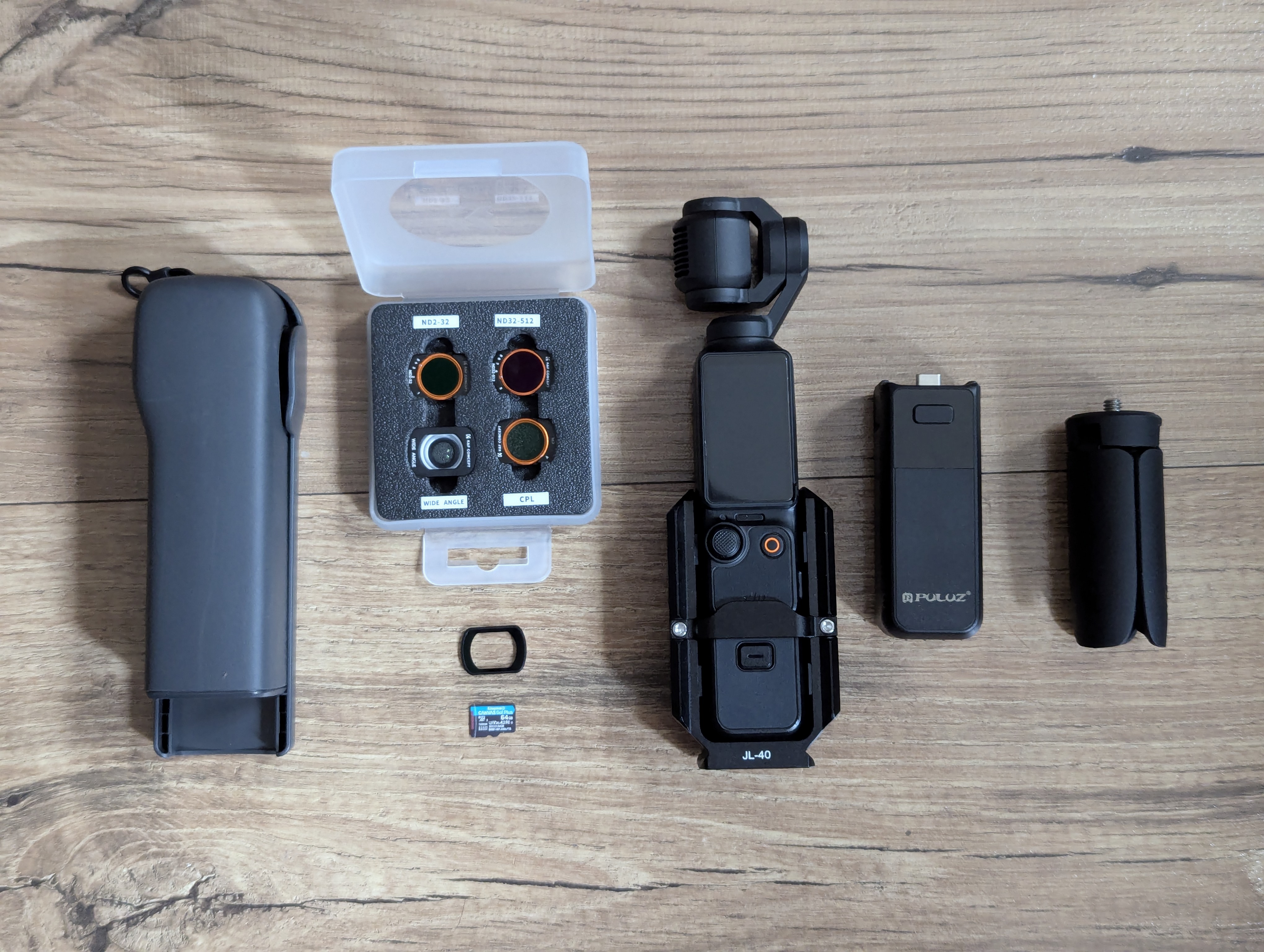 Osmo pocket + lens filters, extended battery grips, tripod & cage