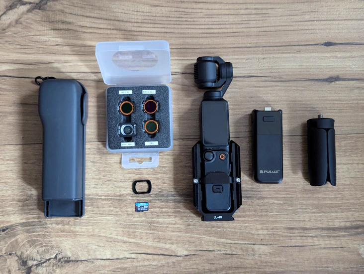 Osmo pocket + lens filters, extended battery grips, tripod & cage