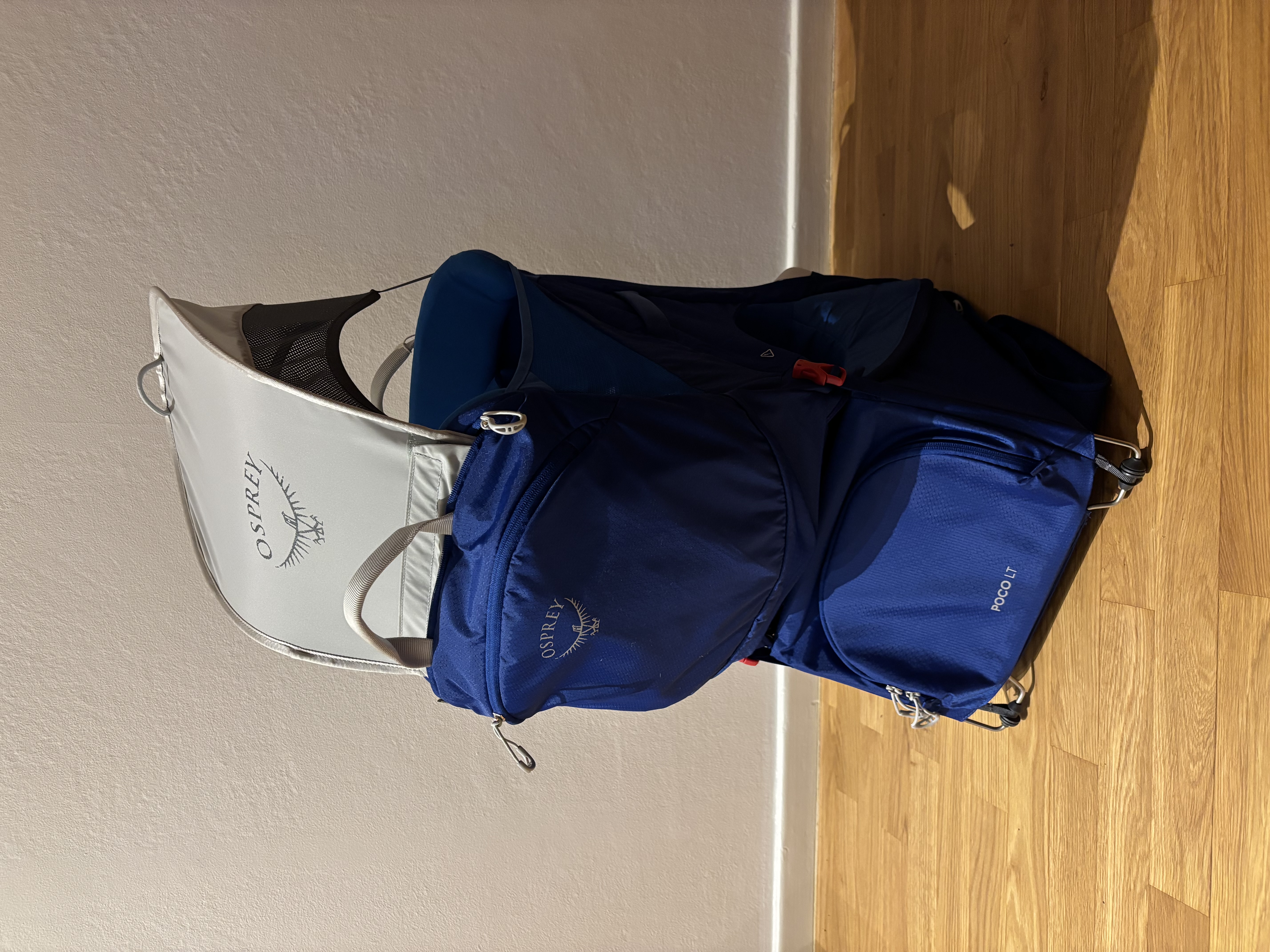 Osprey poco lt bärstol + regnskydd