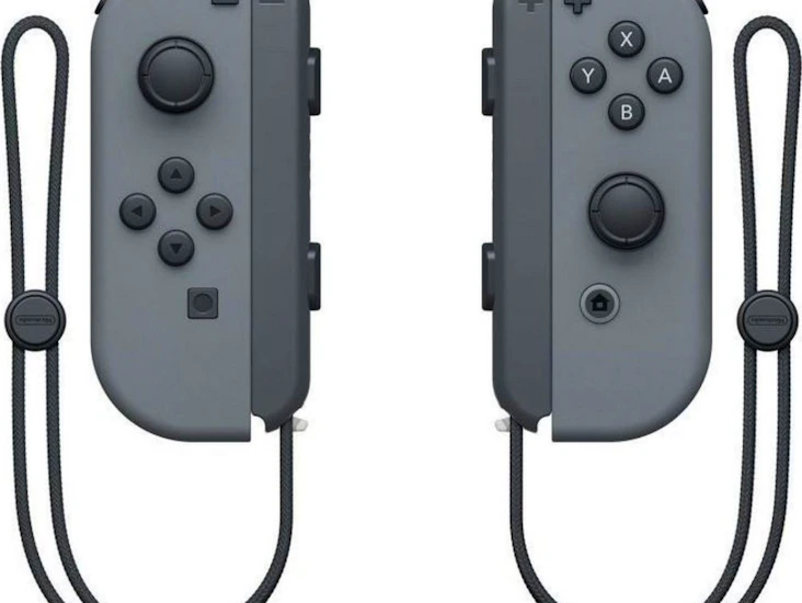 Nintendo switch med 2 kontroller og 3 spill