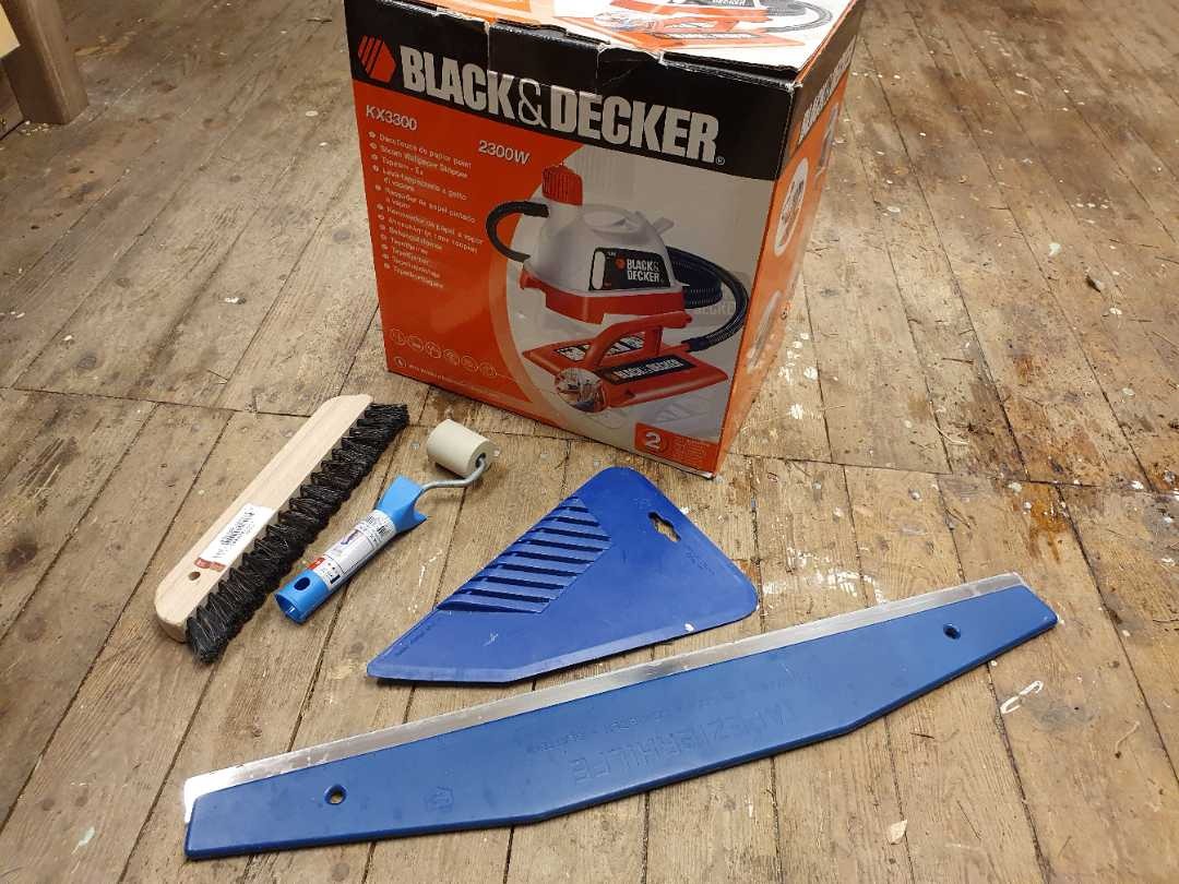 Tapetborttagare och tapetseringsverktyg