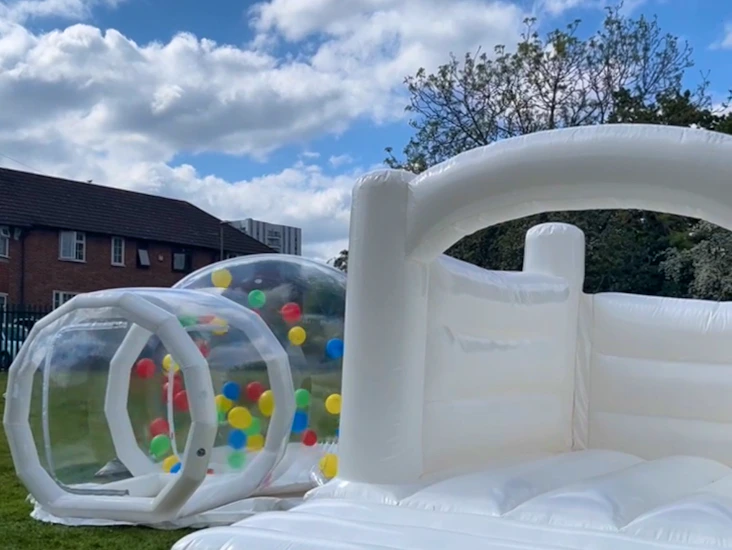 White bouncy castle + balloon house