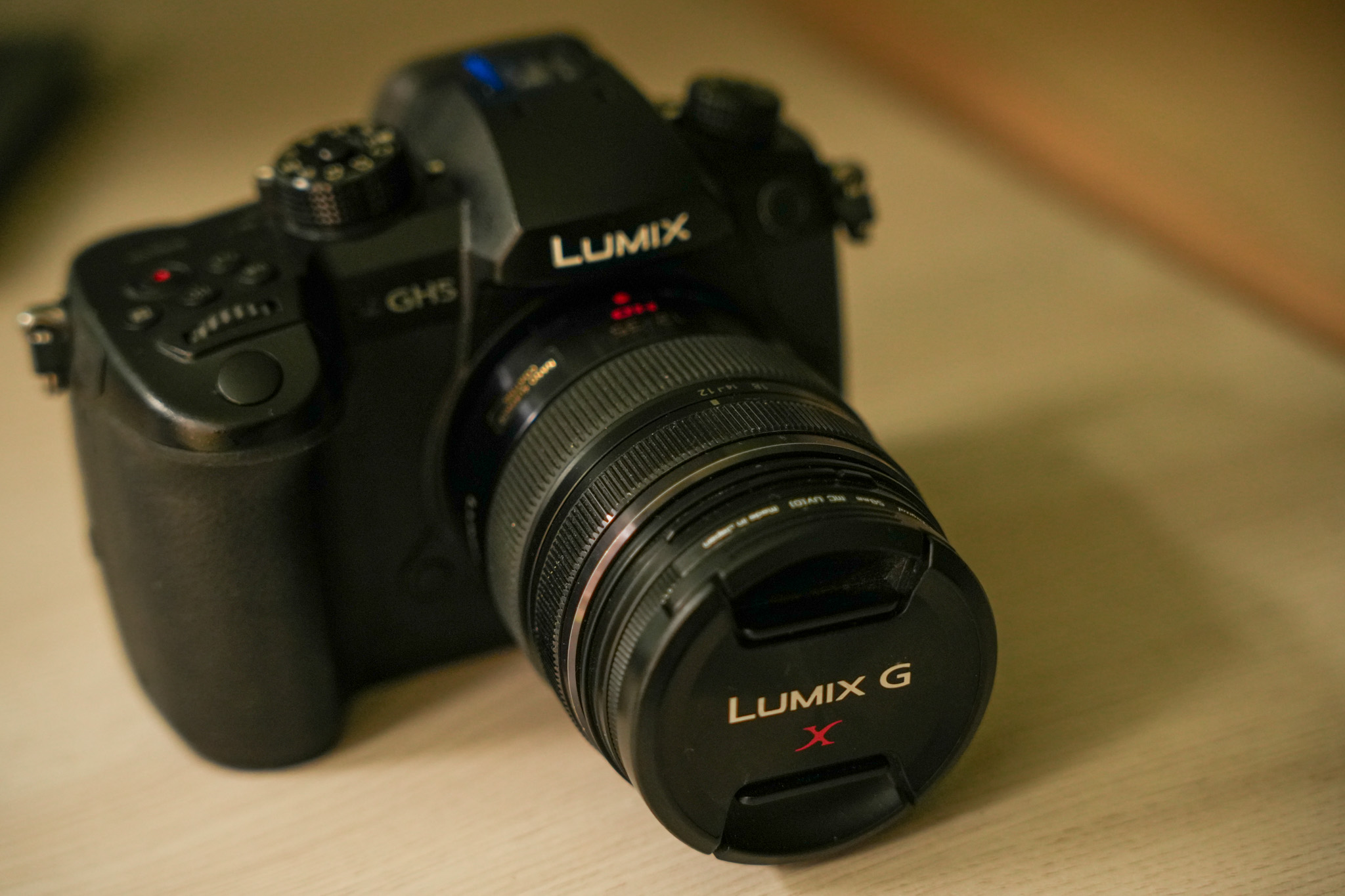 Panasonic gh5 with 12-35mm, f2.8-22 lens and three rechargeable batteries