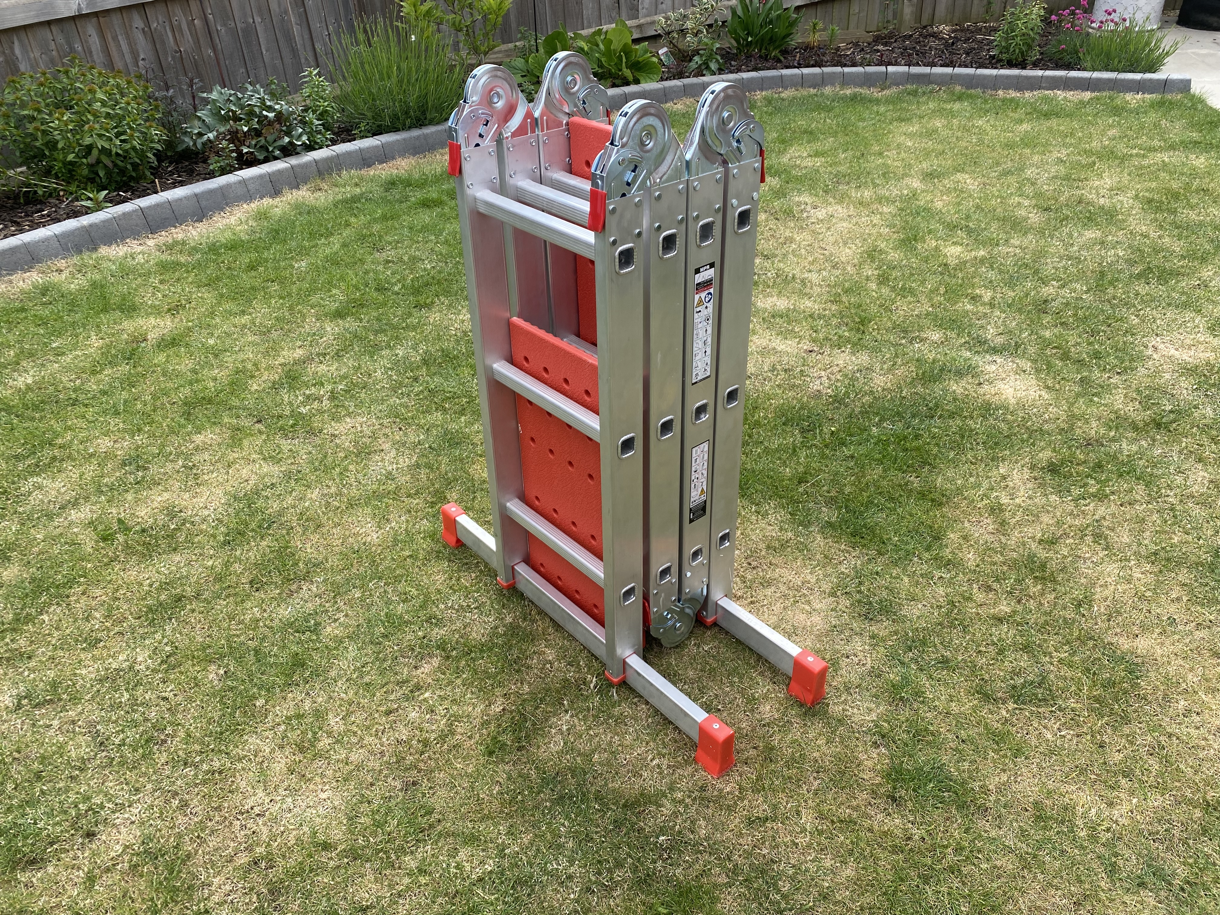 Combination ladder with platform