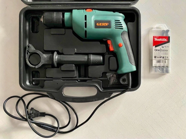 Iskuporakone ja terät