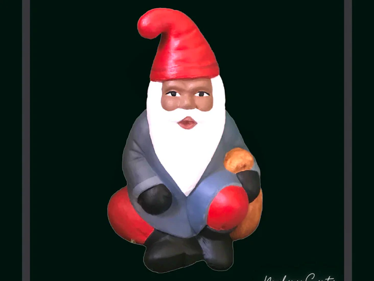 Grå handgjord tomte i gips av melaninsanta