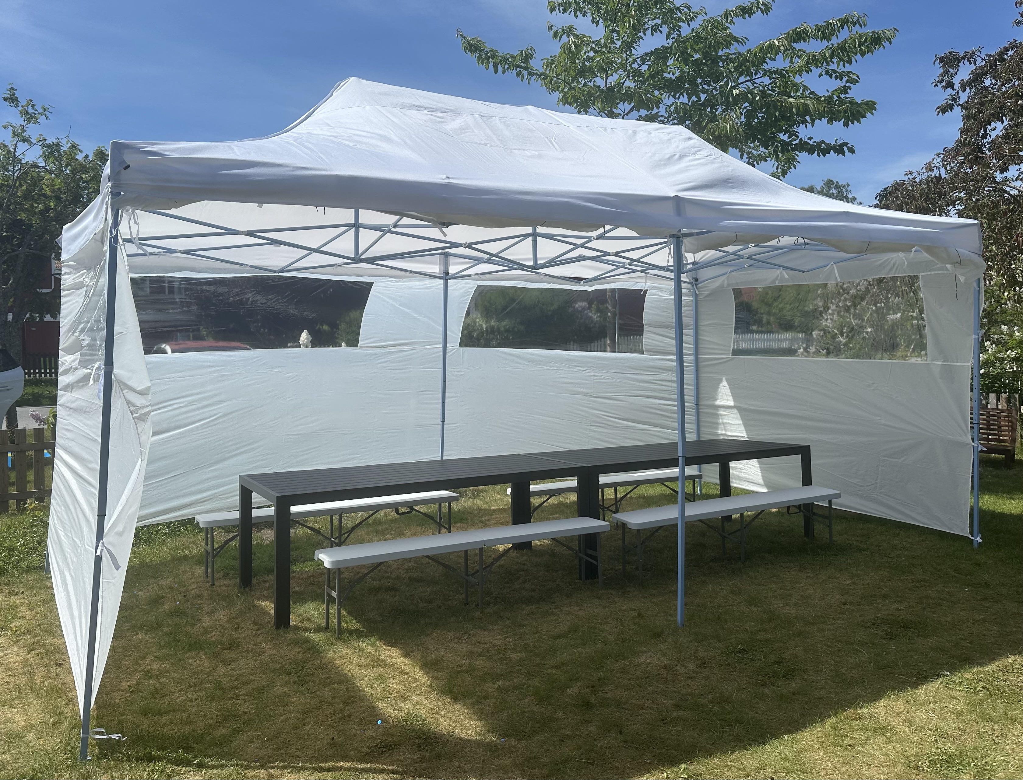 Enkelt pop-up partytält 6x3m inkl bord och bänkar