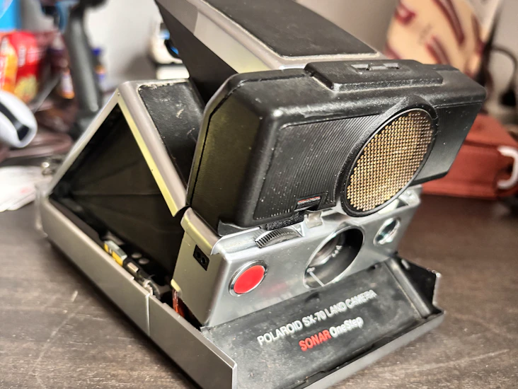 Polaroid sx70 sonar changed to use i-type film