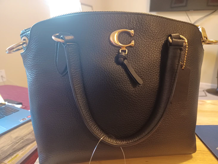 Coach handbag, black with gold trim