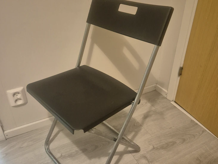 20 st svarta klappstolar